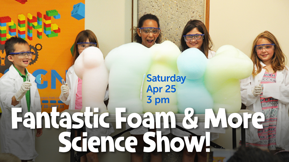 group of smiling children covered in colorful foam as part of a science show, with event text