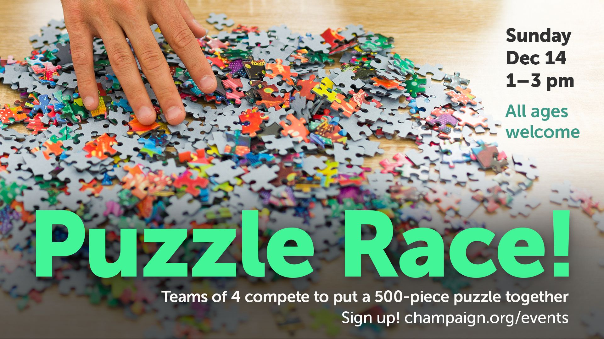High school students stand together smiling and hold giant checks