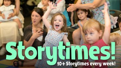 Children dancing and smiling during storytime