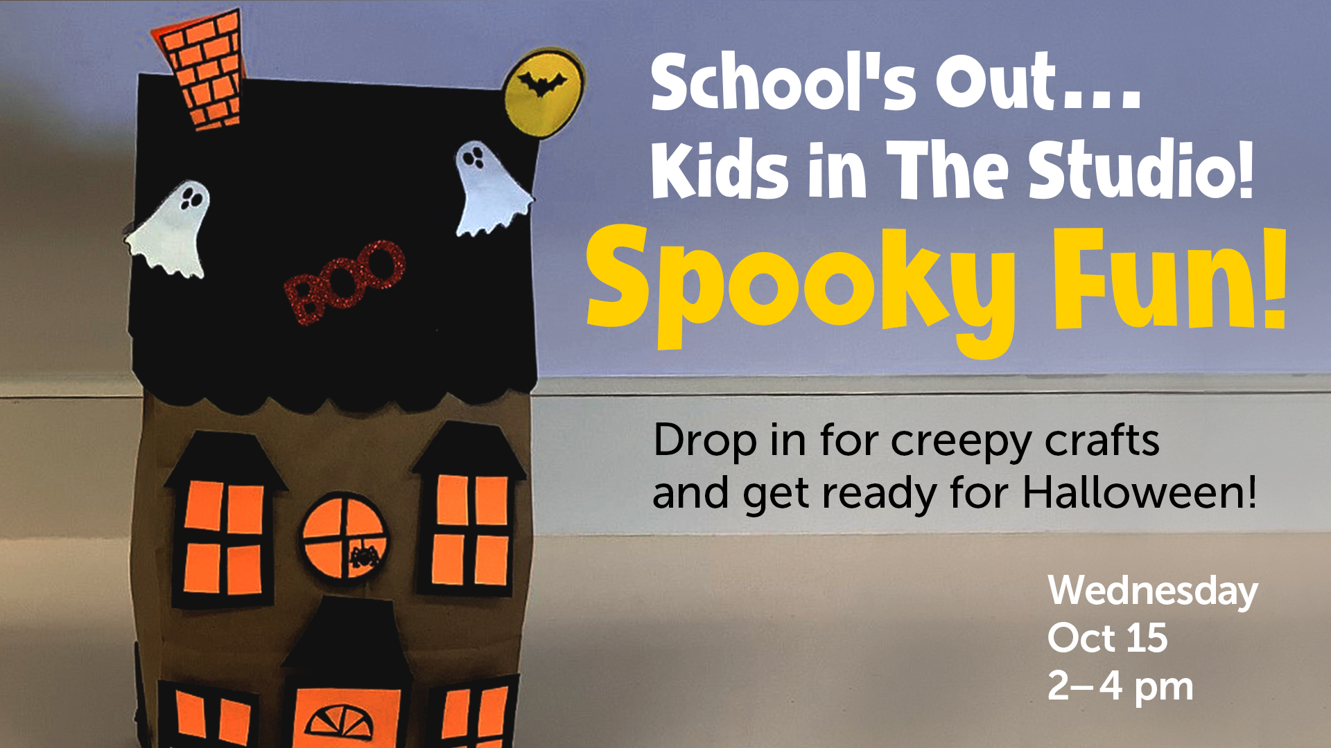 A paper bag house halloween craft displayed with event information